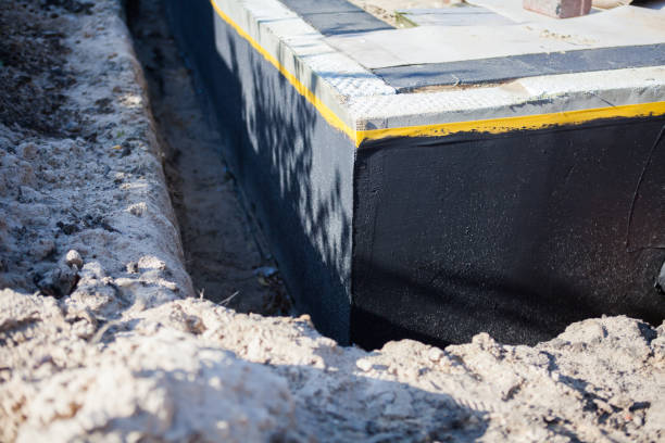 Professional Basement Waterproofing technician working in Cottage Grove, OR